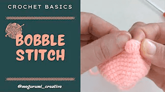Here's the Bobble (5dc Bobble): Yarn over, insert hook, pull up a loop, yarn over, pull 
through 2 → repeat 5 times in the same stitch. You should have 6 loops on your hook. Yarn
over, pull through all loops.
